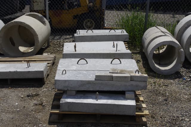 Precast concrete meter vault in an outdoor yard